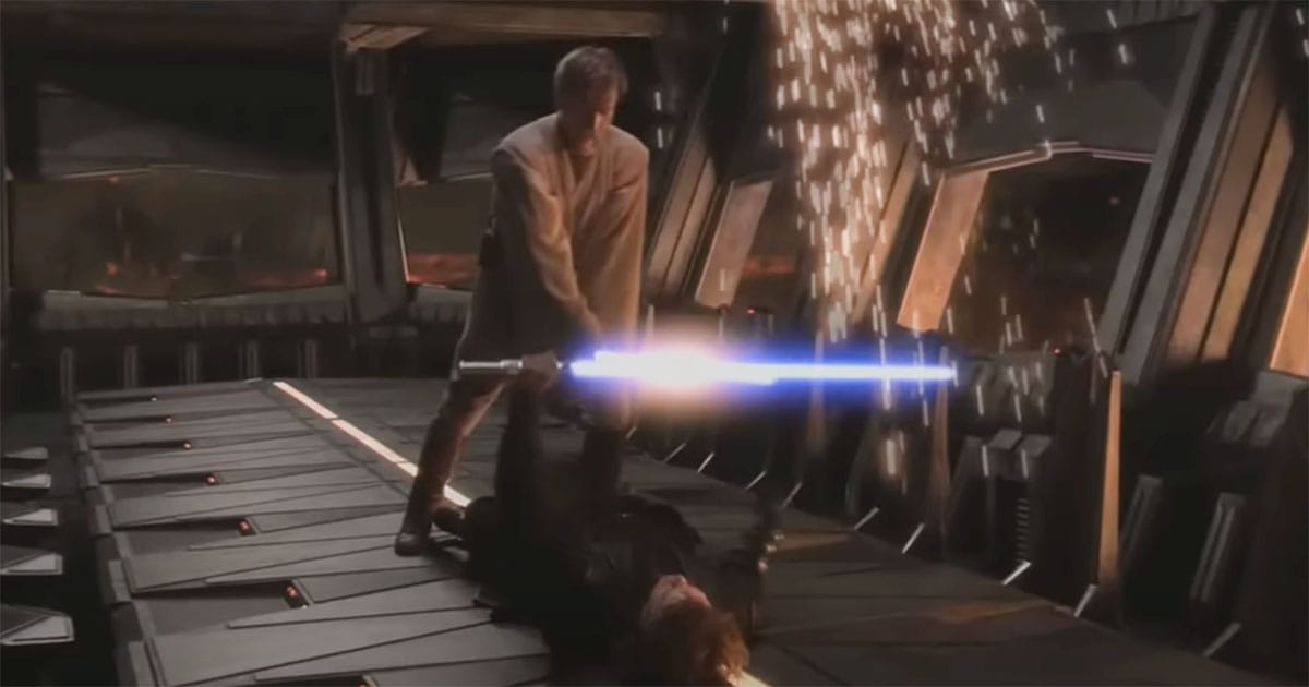 Obi-Wan Kenobi standing over a defeated Anakin Skywalker with lightsabers crossed during their duel on Mustafar in "Revenge of the Sith"