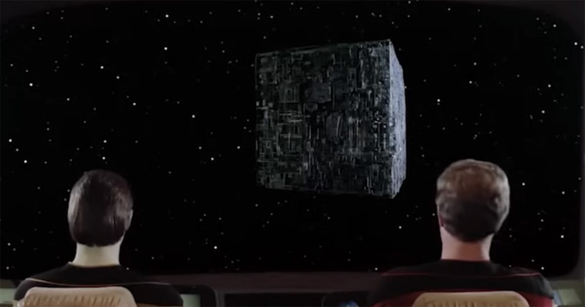 View from the bridge of the Enterprise-D showing a Borg cube floating in space, from "Star Trek: The Next Generation."