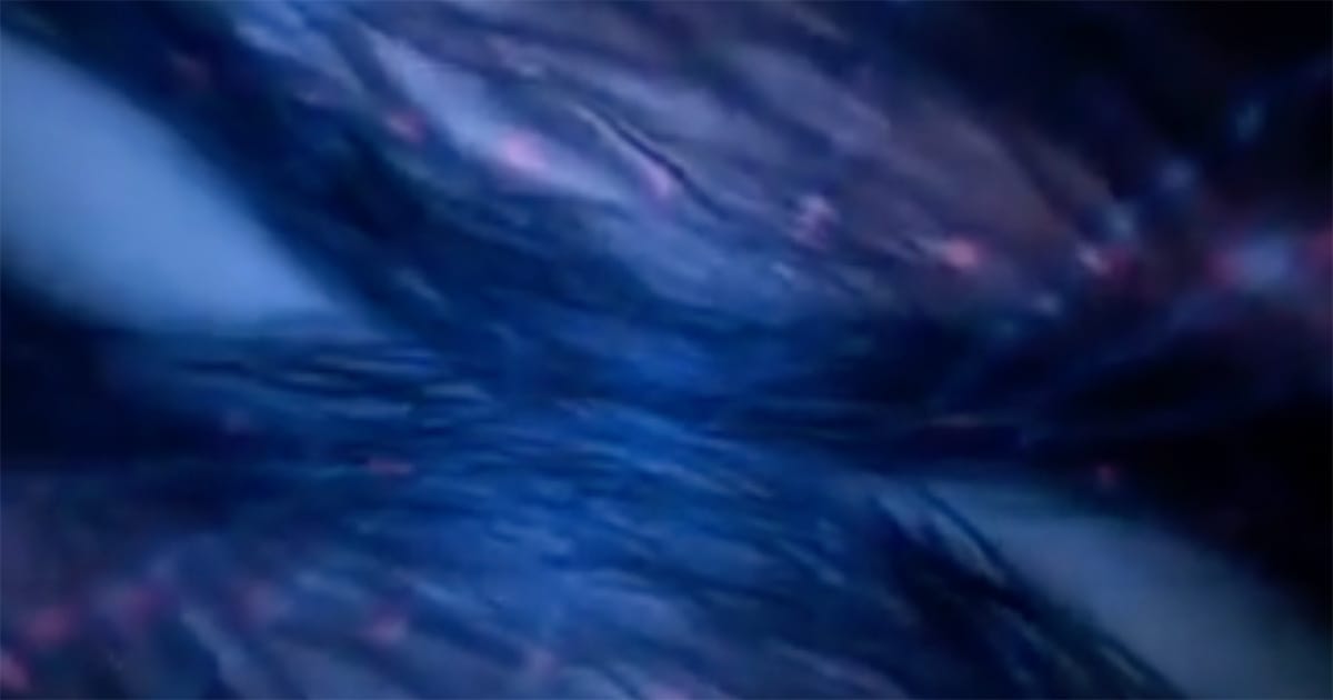 Blue and violet energy streams swirl in V’Ger’s interior, representing its immense power and mystery in "Star Trek: The Motion Picture."