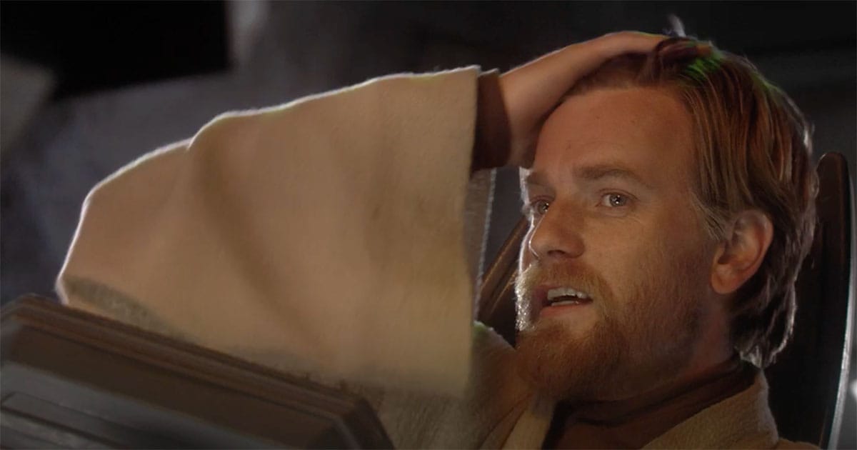 Obi-Wan Kenobi, played by Ewan McGregor, looking distressed while piloting in "Revenge of the Sith"