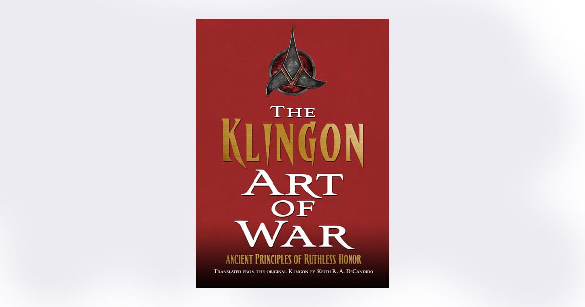 Cover of "The Klingon Art of War" book featuring the Klingon emblem and subtitle "Ancient Principles of Ruthless Honor," inspired by "Star Trek" lore.