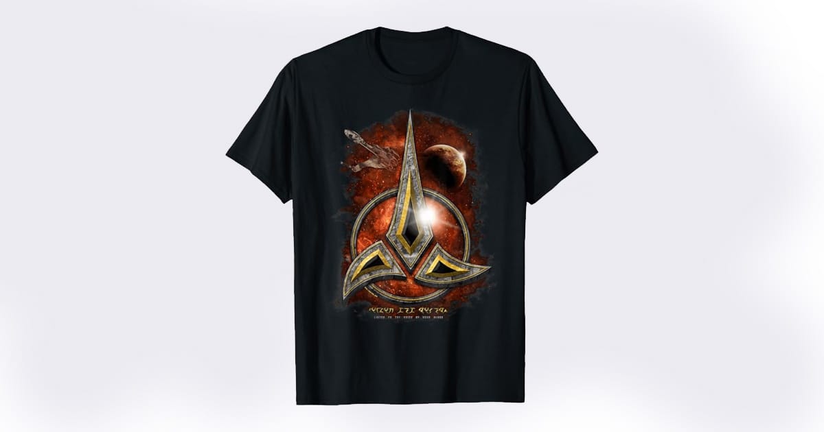 Black T-shirt featuring the Klingon Empire crest with a space battle background and Klingon script, inspired by "Star Trek" iconography.