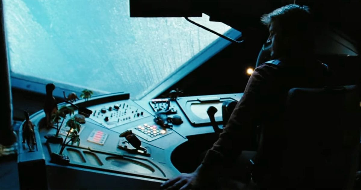 Mal seated in Wash’s pilot chair on Serenity with toy dinosaurs on the console after Wash’s death in "Serenity" (2005)