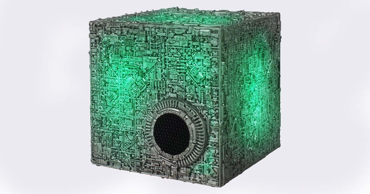 FAMETEK Star Trek Borg Cube Bluetooth speaker glowing green with detailed cybernetic texture and central speaker grille