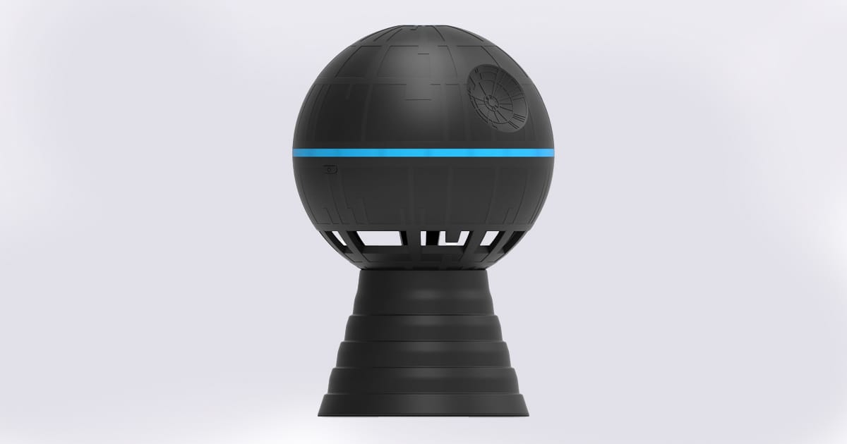 Black spherical Bluetooth speaker modeled after a sci-fi space station with blue LED band and conical base