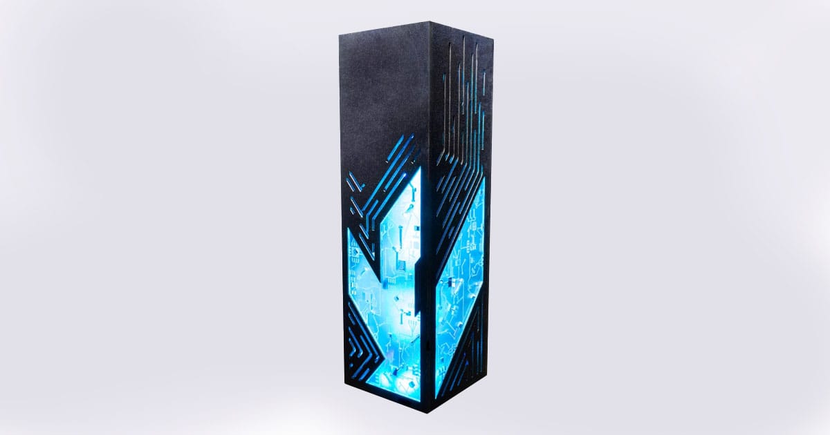 Tall rectangular LED desk lamp with futuristic circuit-inspired cutouts and glowing blue interior light design
