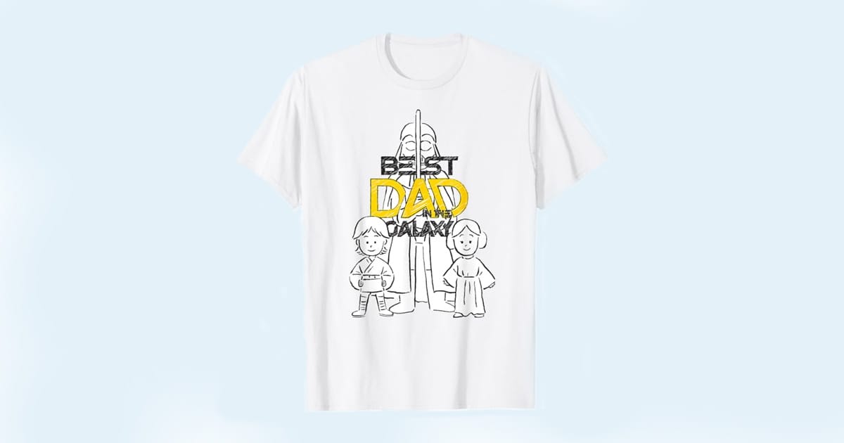 White T-shirt with doodle-style Darth Vader, Luke, and Leia and the phrase "Best Dad in the Galaxy" in black and yellow text