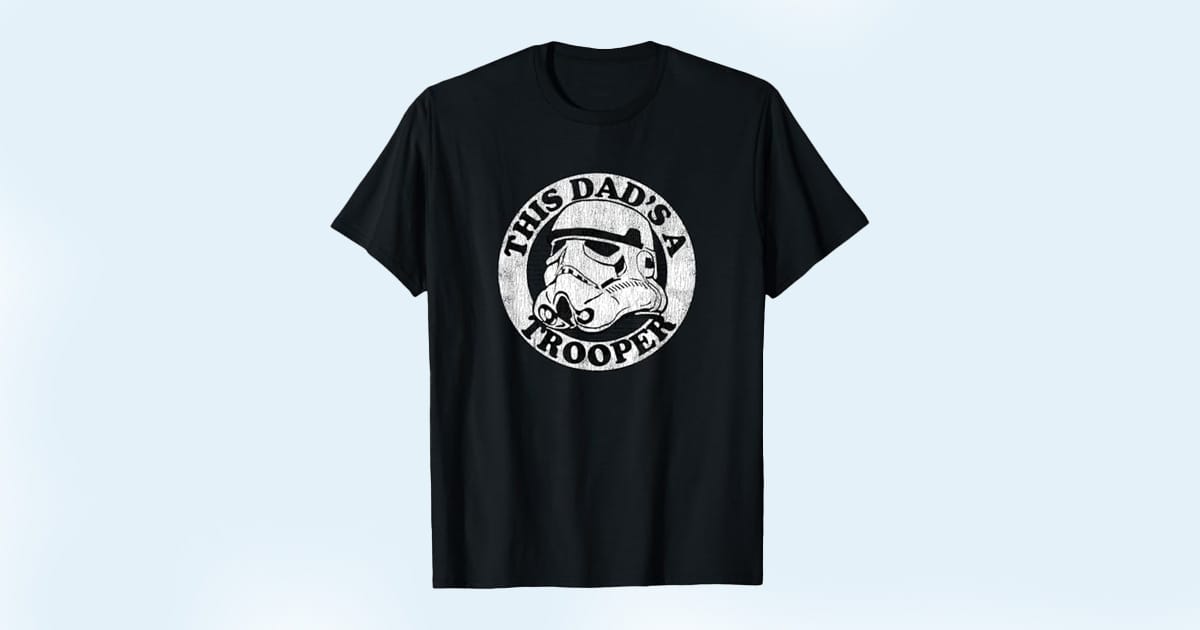 Black T-shirt with white Stormtrooper helmet and the phrase "This Dad's a Trooper" in a circular badge design