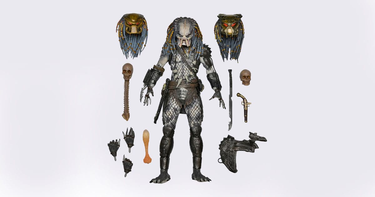 Elder Predator action figure by NECA, surrounded by detailed accessories including skull trophies, wrist blades, flintlock pistol, and alternate heads, arranged in ceremonial layout