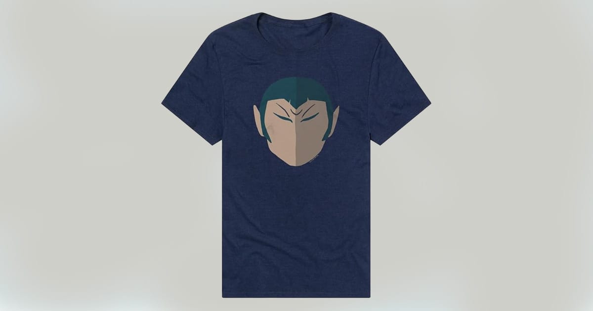Navy blue Star Trek T-shirt with minimalist Romulan face graphic showing pointed ears and angular hairline.