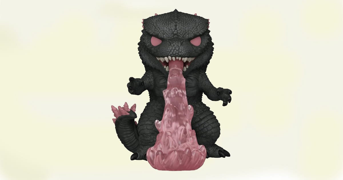 Funko POP Godzilla figure in black with pink accents, shown roaring while firing a translucent pink heat-ray.