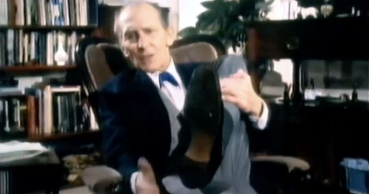 Peter Cushing holding up his foot while explaining that the costume boots for "Star Wars" were too small for him to wear comfortably.