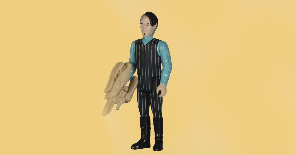 Funko ReAction action figure of Zorg from The Fifth Element holding a futuristic weapon with striped suit and blue shirt.