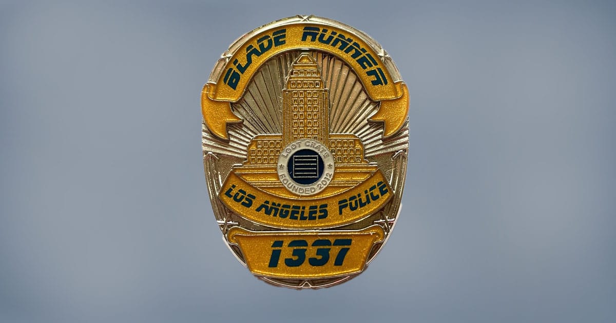 Blade Runner Los Angeles Police badge with gold and black detailing and building emblem.