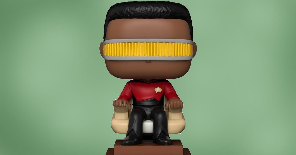 Funko Pop figure of Geordi La Forge from Star Trek: The Next Generation seated in a command chair, wearing red Starfleet uniform and yellow visor, against green background