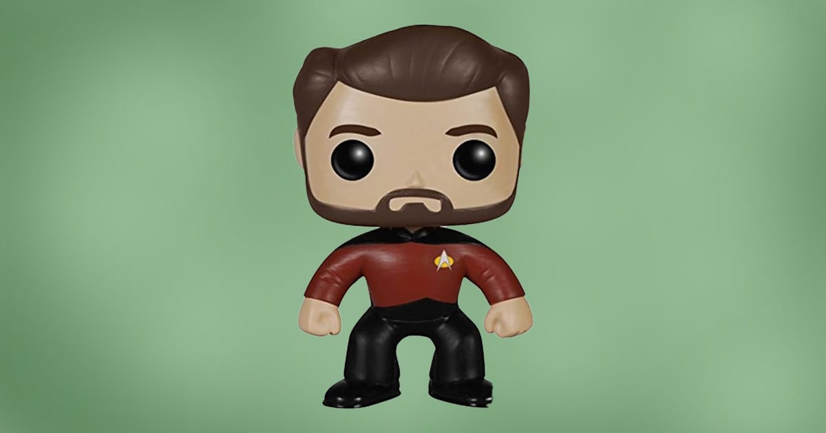 Funko Pop figure of Commander William Riker in red Starfleet uniform with beard, standing against green background