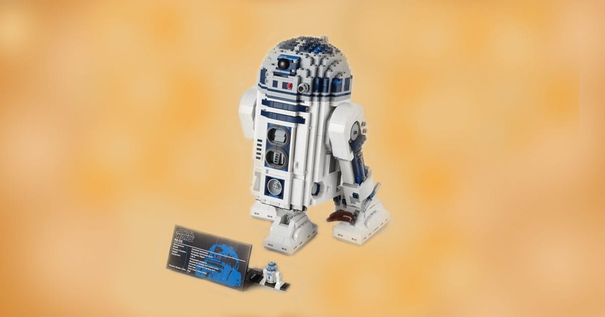 LEGO Star Wars 10225 R2-D2 building set with display plaque and mini R2-D2 figure shown on neutral background.