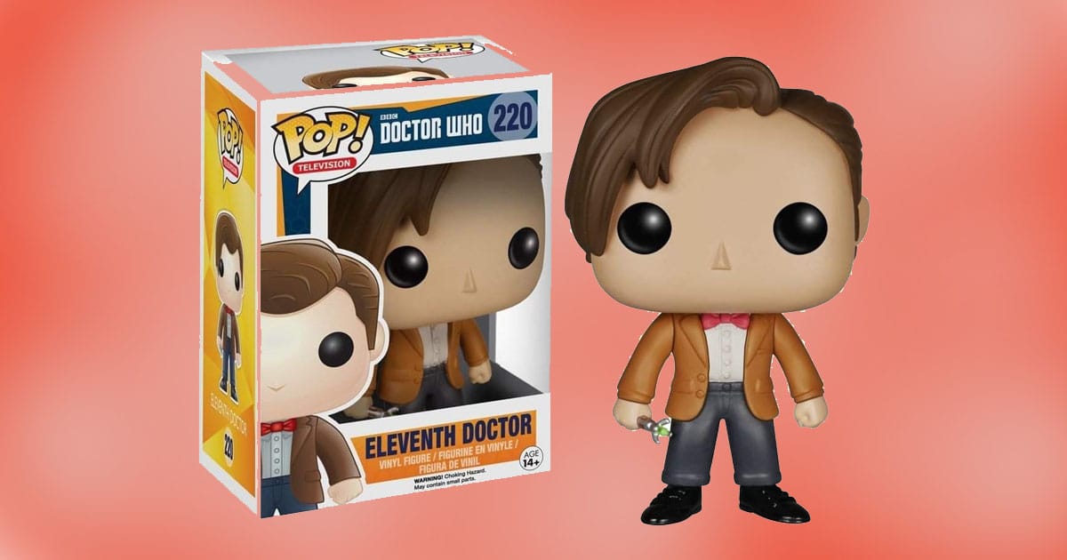 Funko POP vinyl figure of the Eleventh Doctor from Doctor Who, featuring brown jacket, red bow tie, and sonic screwdriver, next to its original box.