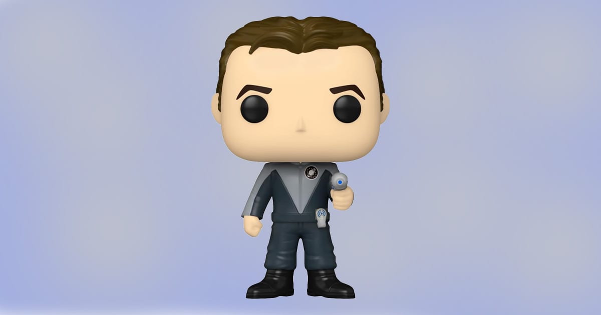Funko Pop figure of Commander Taggart from Galaxy Quest in gray uniform holding a blaster.