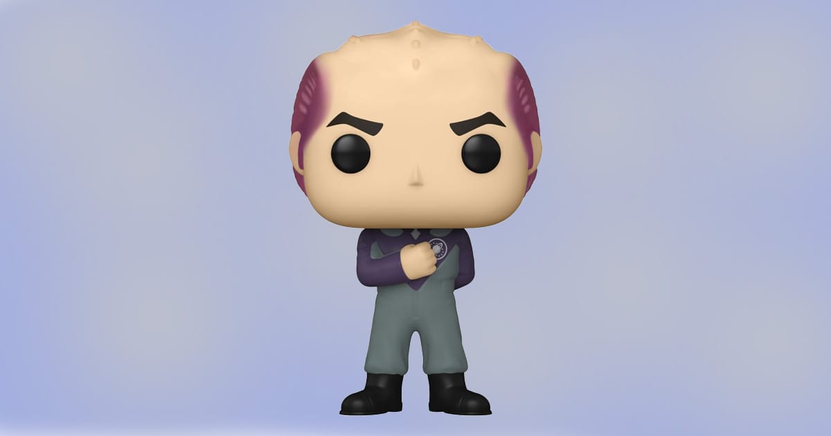 Funko Pop figure of Dr. Lazarus from Galaxy Quest with purple and gray uniform and solemn pose