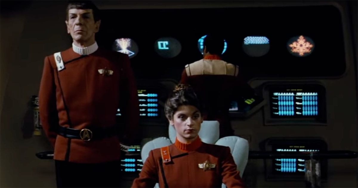 Spock and a young Starfleet officer on the bridge, symbolizing new leadership in Star Trek.