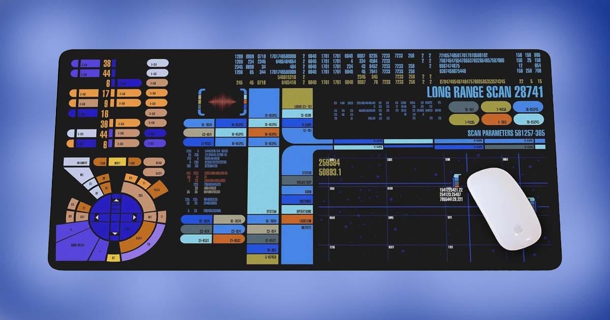 Star Trek The Original Series gaming mat featuring LCARS-style control panel design with colorful interface graphics on a blue background.