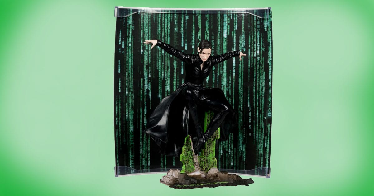 McFarlane Toys Trinity 6-inch poseable action figure from The Matrix with backdrop of green digital code and environmental base.