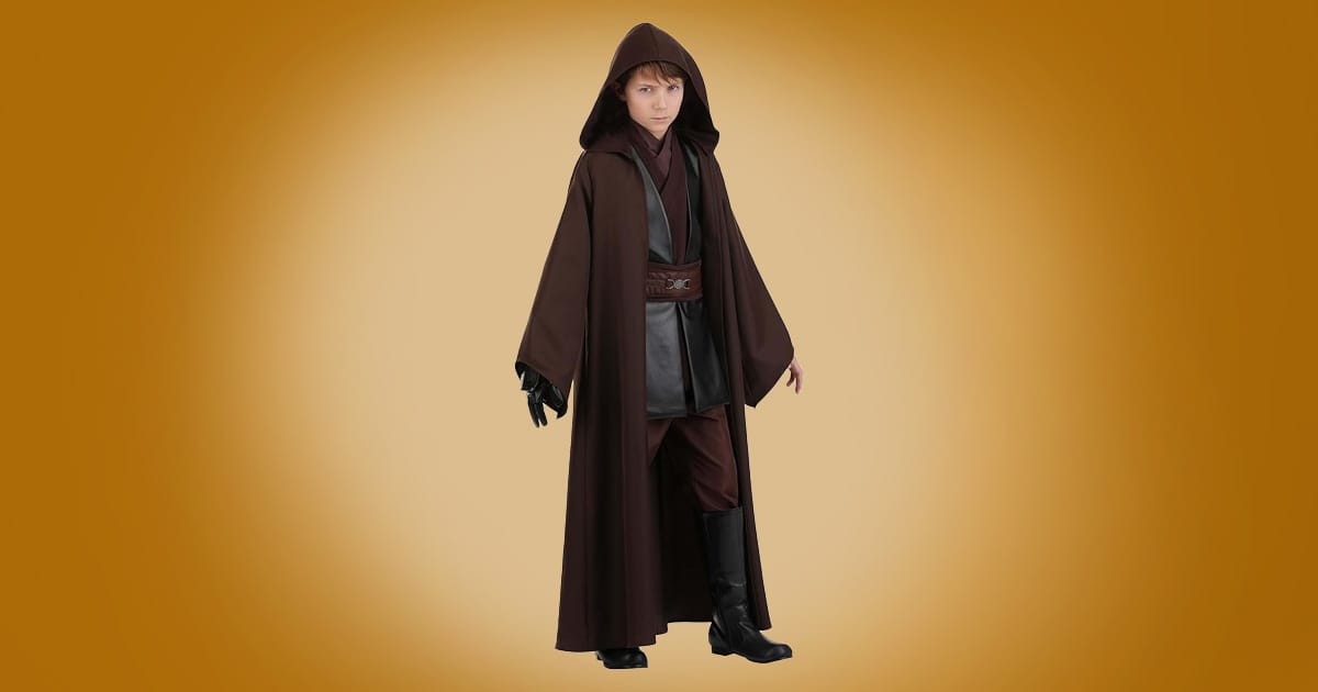 Child Anakin Skywalker Star Wars costume with brown hooded robe, tunic, belt, and black boots on orange background