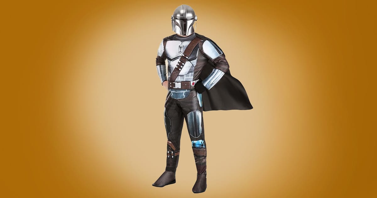 Adult Mandalorian Star Wars costume with silver beskar armor, helmet, brown belt, and black cape on orange background.