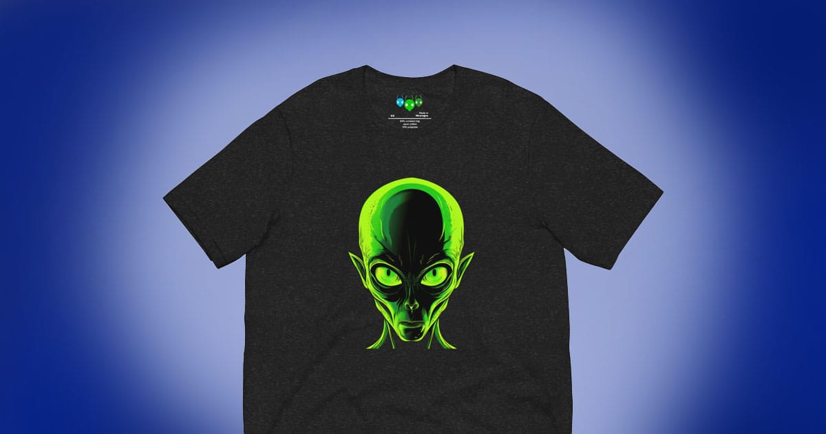 Black T-shirt with a vivid green alien head graphic, glowing eyes and pointed ears.