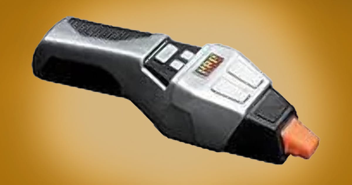 "Star Trek The Next Generation" phaser prop accessory with gray and black design.