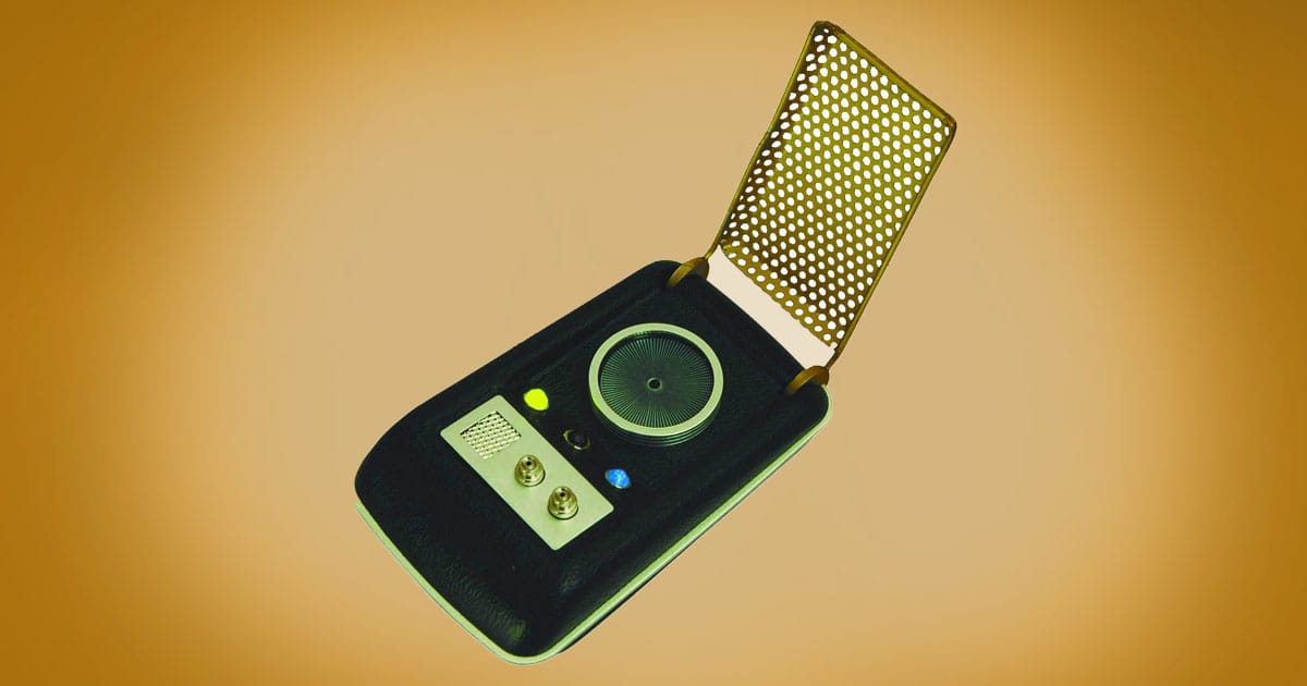 "Star Trek The Original Series" communicator prop replica with flip open cover.