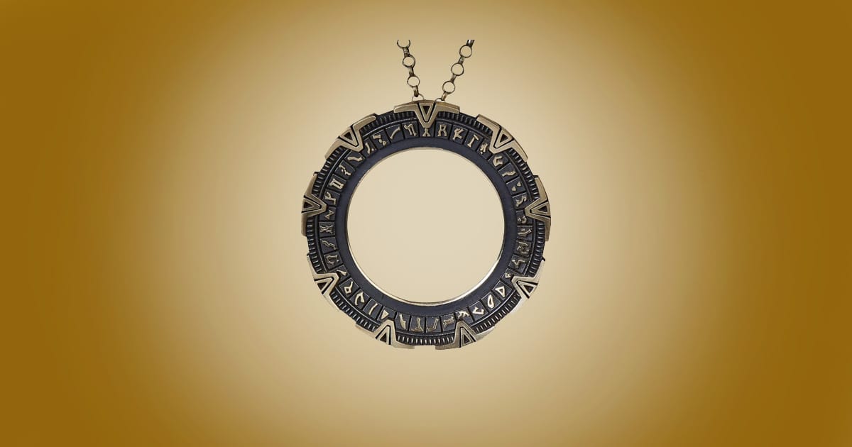 Stargate Atlantis brass pendant necklace with engraved chevrons and chain collectible jewelry.