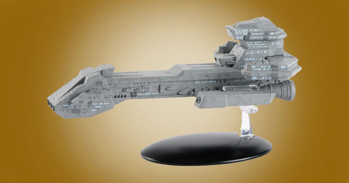 Stargate Prometheus ship replica die-cast collectible model on display stand.