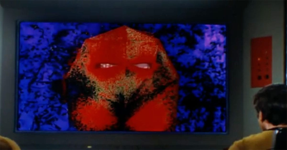 The face of the unknown challenges the calm faith of the Enterprise.