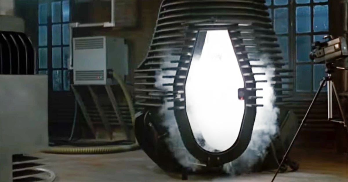 A dark laboratory with a large teleportation pod standing silent after the experiment.