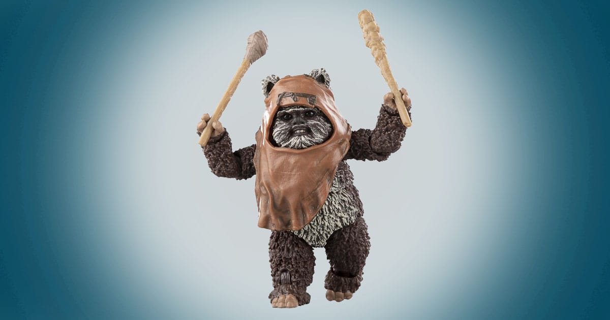 Wicket W. Warrick Ewok action figure from Star Wars Return of the Jedi holding wooden clubs.