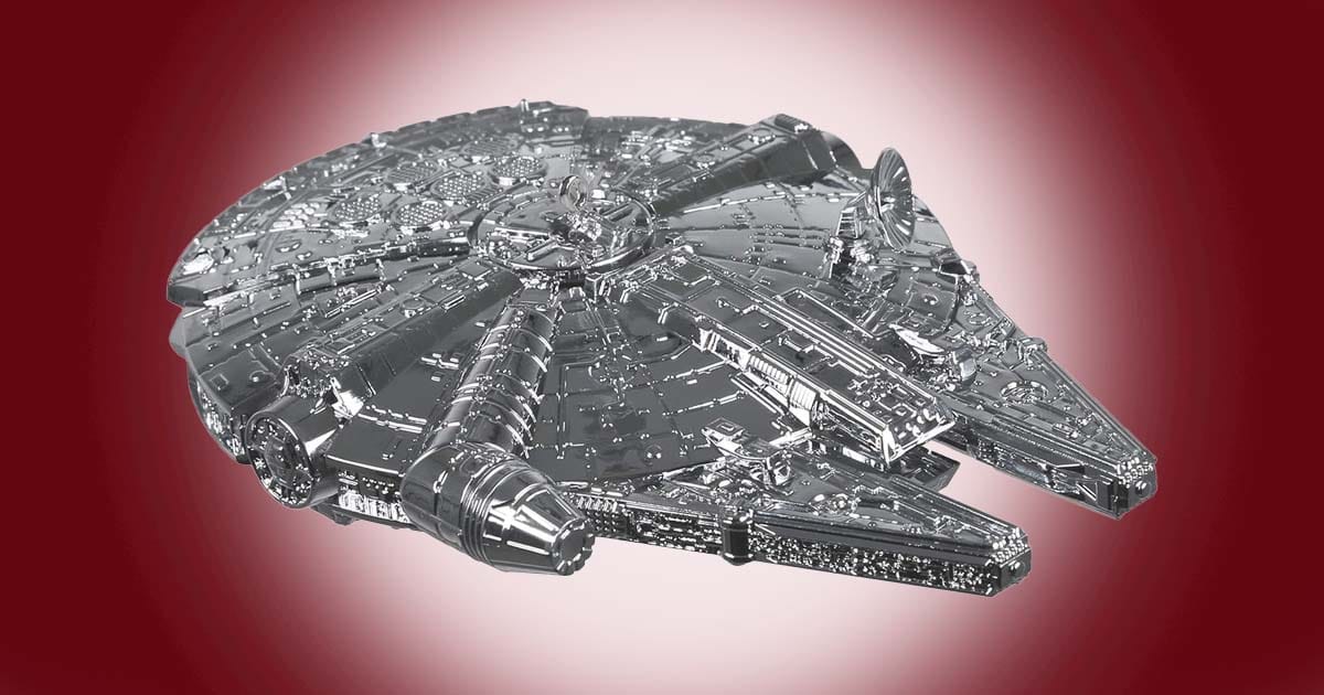 Hallmark metal Christmas ornament of the Millennium Falcon starship from Star Wars.