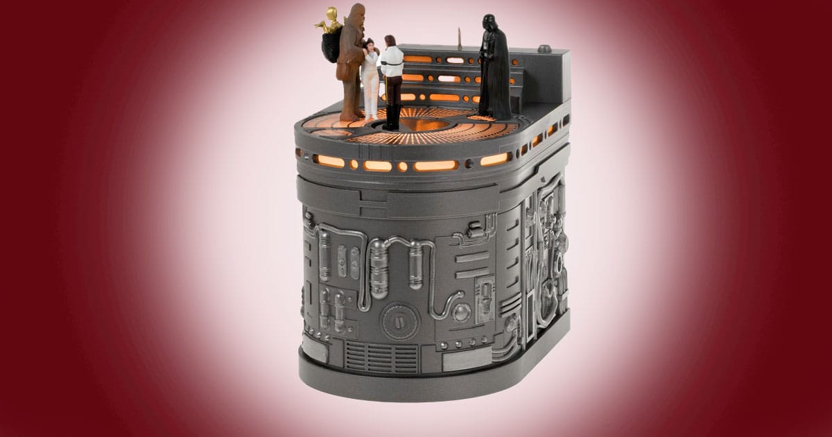 Hallmark Christmas ornament of the Star Wars Carbon-Freezing Chamber scene with light and figures.