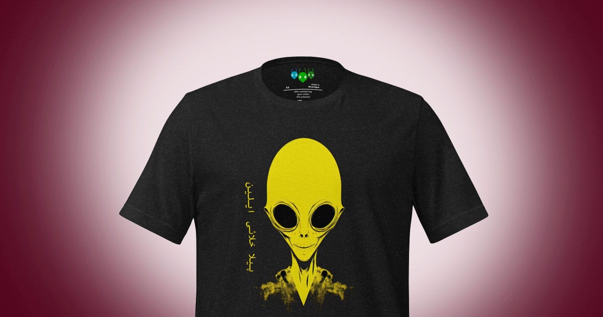 Black t-shirt featuring a yellow conehead alien illustration on the front