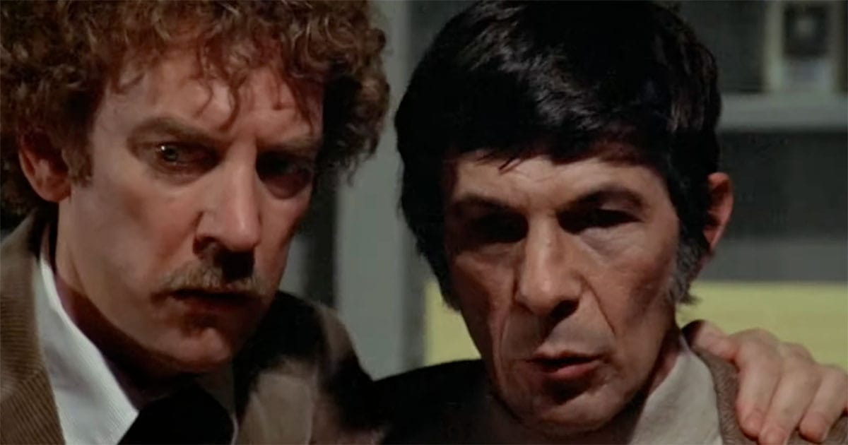 Leonard Nimoy in Invasion of the Body Snatchers scene with concerned expression.