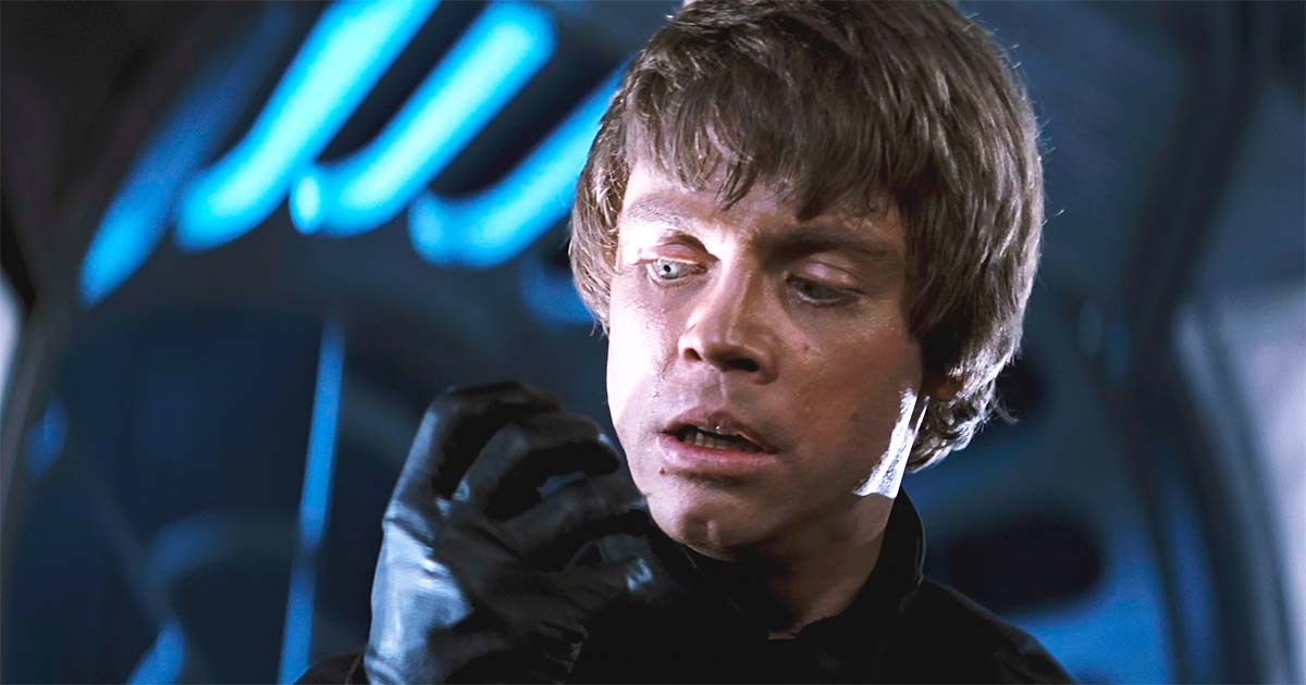 Luke Skywalker looks at his mechanical hand in the throne room in "Return of the Jedi," realizing he is becoming like Darth Vader and choosing not to strike.