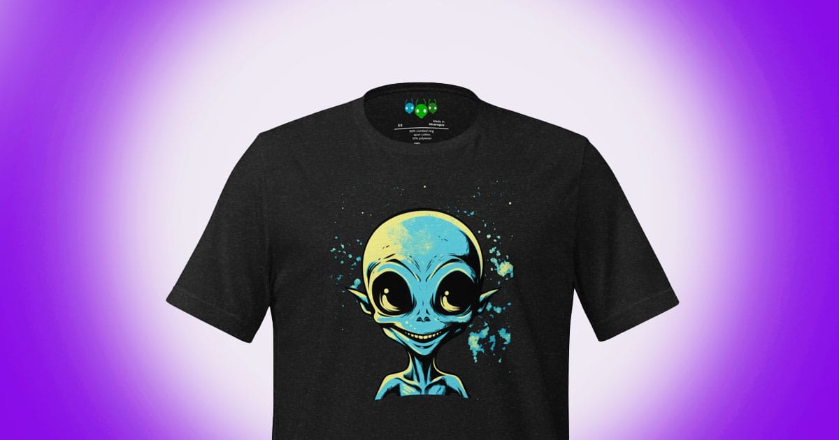 Smiling blue alien head graphic on a black science fiction themed t-shirt.