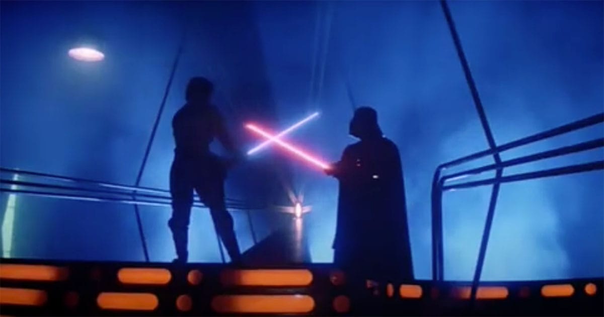 Luke Skywalker confronts Darth Vader on a narrow platform in "The Empire Strikes Back," appearing outmatched as their lightsabers cross.