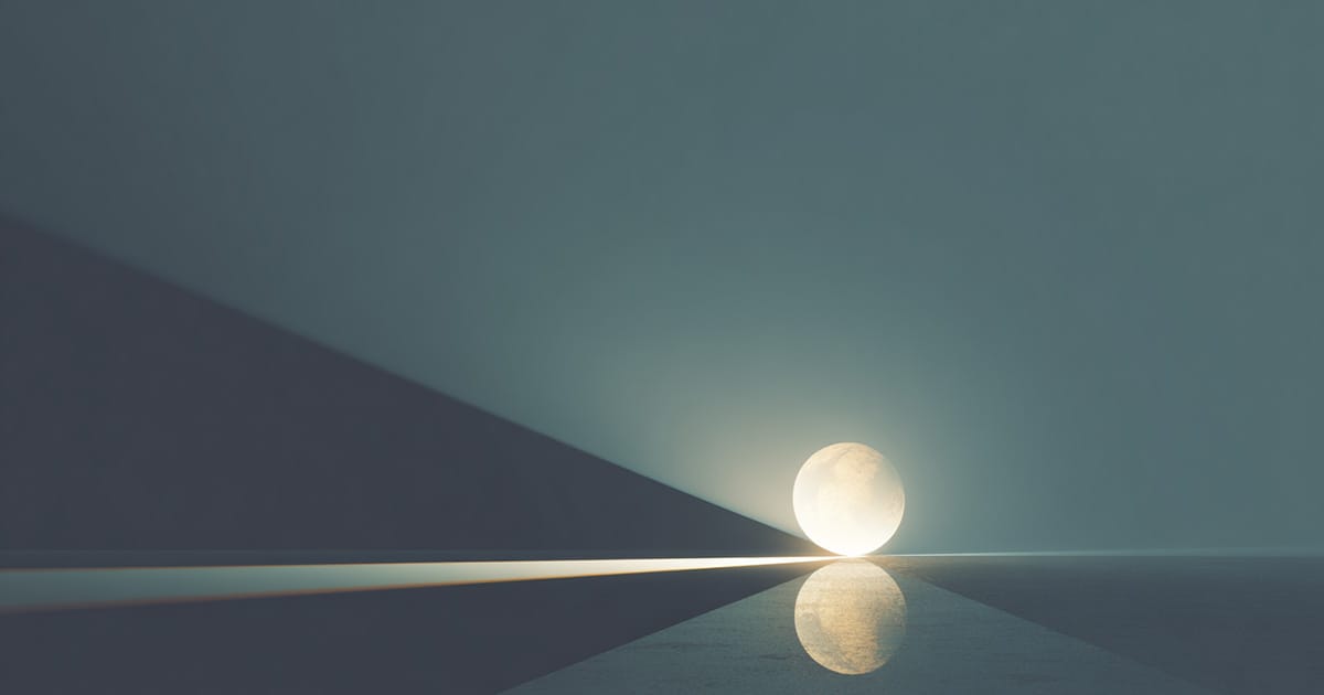 A glowing sphere divided by light and shadow in a minimalist abstract futuristic setting.