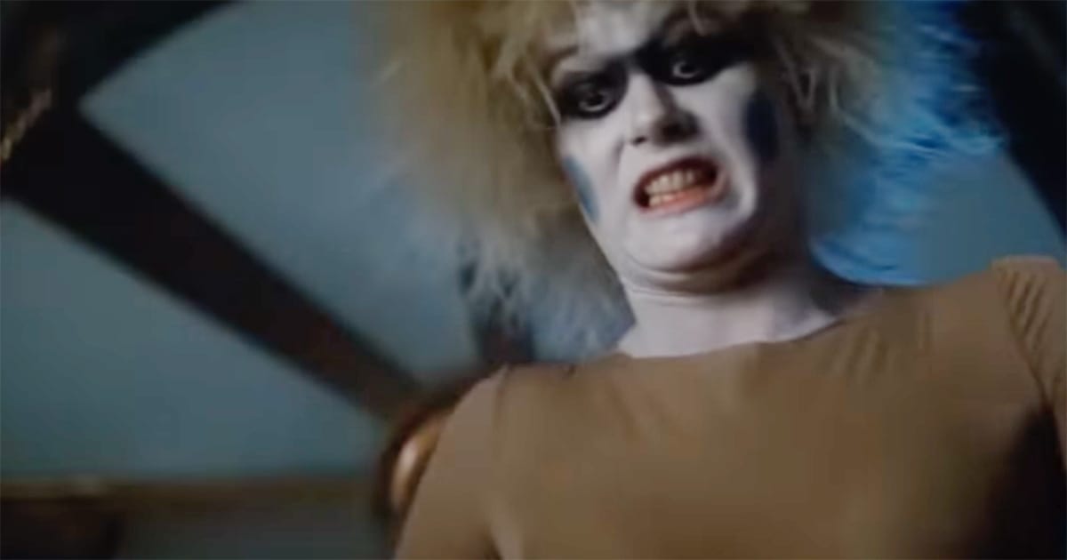 Pris, a replicant in "Blade Runner," attacks violently during a confrontation scene showing her strength and unpredictability.