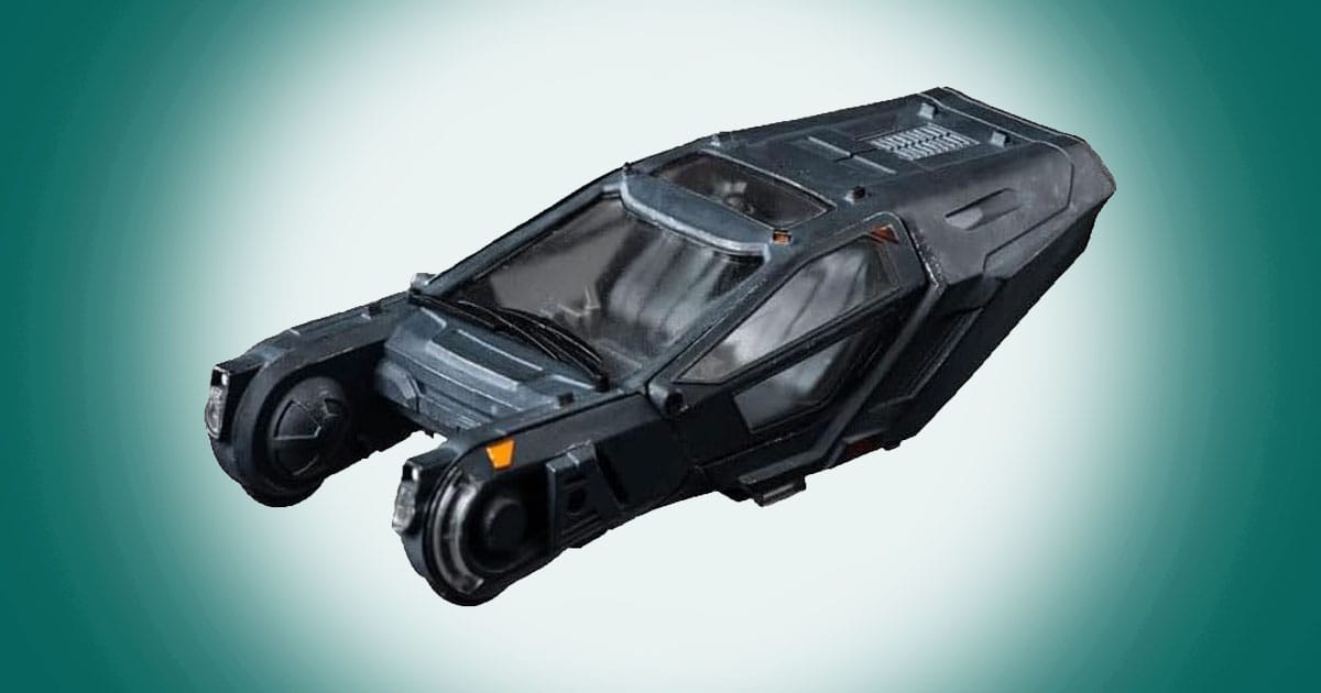 Die cast model of K’s Spinner vehicle from Blade Runner 2049 featuring futuristic design with enclosed cockpit and industrial detailing.
