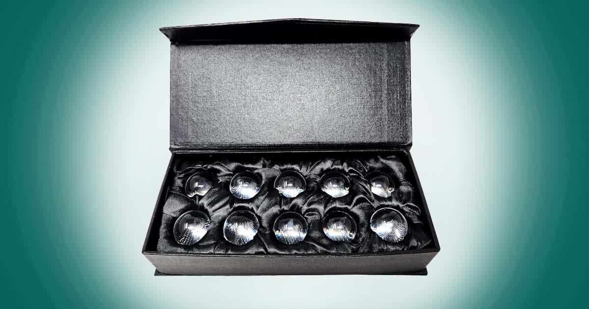 Set of Blade Runner 2049 memory orb replicas displayed in a black presentation box with multiple clear crystal spheres.