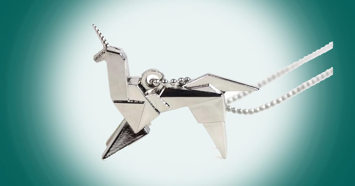 Blade Runner origami unicorn pendant necklace in metallic finish displayed with chain highlighting its folded geometric design.