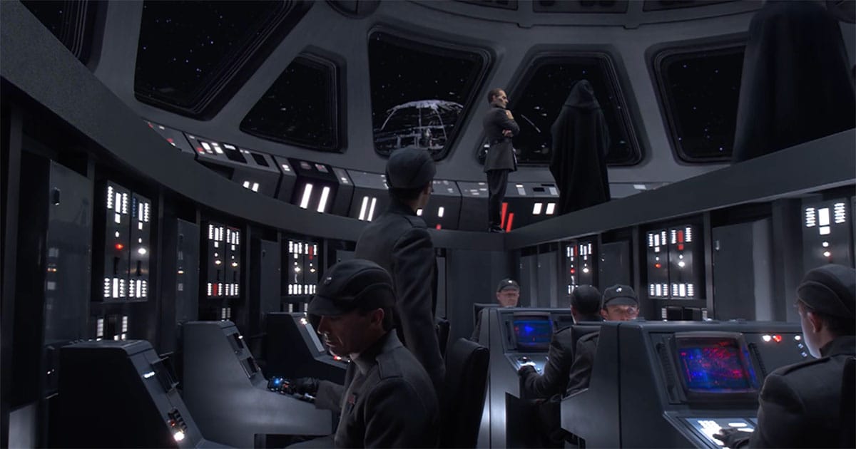 Death Star control room with Darth Vader and Imperial officer above technicians operating consoles in a structured hierarchical command system